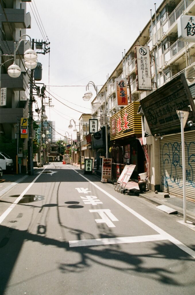 Photo of Empty Street Between Buildings